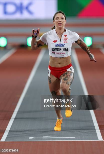 Ewa Swoboda of Team Poland crosses the finish line to win in the Women's 60 Metres Heats on Day Two of the World Athletics Indoor Championships...