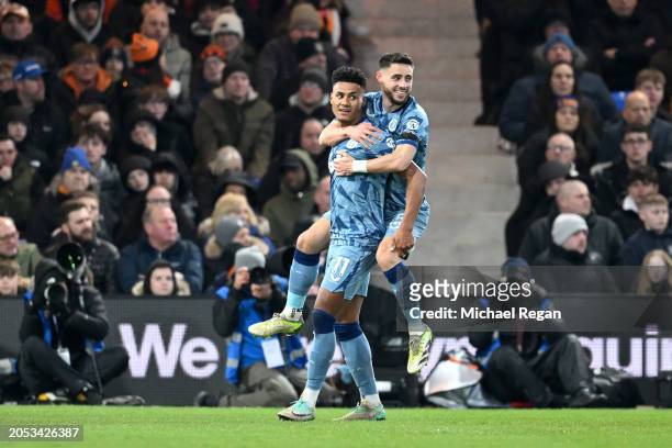 Ollie Watkins of Aston Villa celebrates with Alex Moreno of Aston Villa after scoring his team's first goal during the Premier League match between...