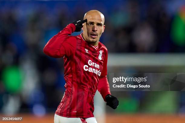 Sandro Ramirez of Las Palmas celebrates after scoring his team's first goalduring the LaLiga EA Sports match between Getafe CF and UD Las Palmas at...