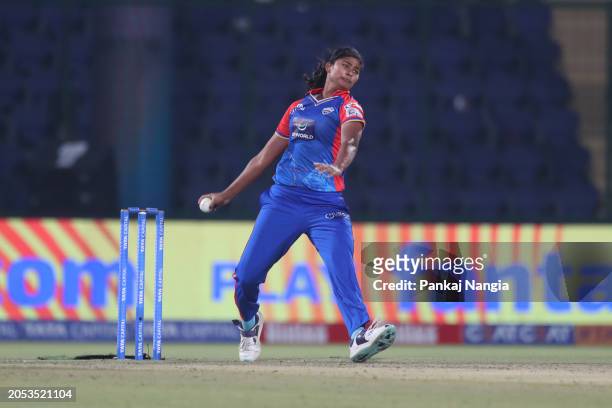 Radha Yadav of Delhi Capitals delivers a ball during the WIPL match between Delhi Capitals and Mumbai Indians at Arun Jaitley Stadium on March 5,...