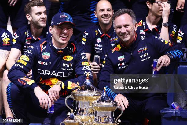 Race winner Max Verstappen of the Netherlands and Oracle Red Bull Racing and Oracle Red Bull Racing Team Principal Christian Horner pose for a team...