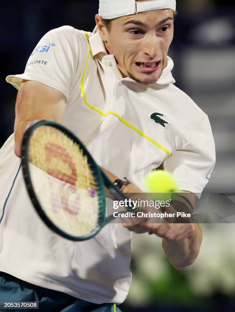 Ugo Humbert of France plays a backhand against Alexander Bublik of Kazakhstan in the final match during the Dubai Duty Free Tennis Championships at...