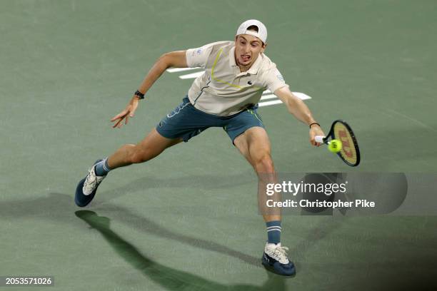 Ugo Humbert of France plays a forehand against Alexander Bublik of Kazakhstan in the final match during the Dubai Duty Free Tennis Championships at...