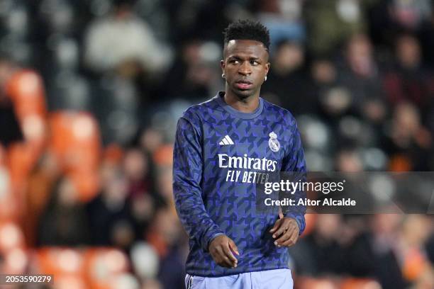 Vinicius Junior of Real Madrid looks on during the warmup prior to the LaLiga EA Sports match between Valencia CF and Real Madrid CF at Estadio...