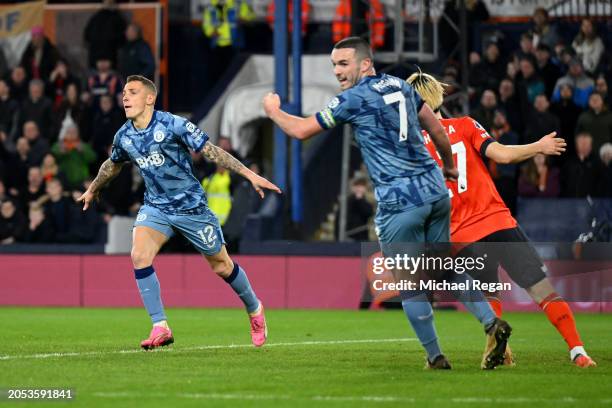 Lucas Digne of Aston Villa celebrates scoring his team's third goal during the Premier League match between Luton Town and Aston Villa at Kenilworth...