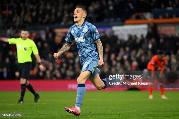 Lucas Digne of Aston Villa celebrates scoring his team's third goal during the Premier League match between Luton Town and Aston Villa at Kenilworth...