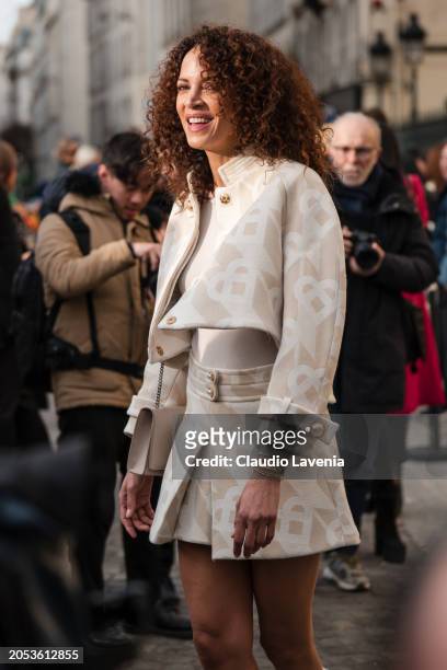 Noémie Lenoir wears beige Casablanca jacket with matching mini skirt, outside Casablanca, during the Womenswear Fall/Winter 2024/2025 as part of...