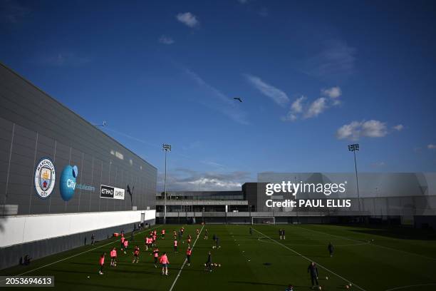 Manchester City's players attend a team training session at their training ground in Manchester in north-west England on March 5 on the eve of their...