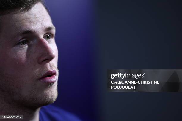 France's lock Thibaud Flament takes part in a press conference after a training session of France's rugby union national team ahead of their upcoming...