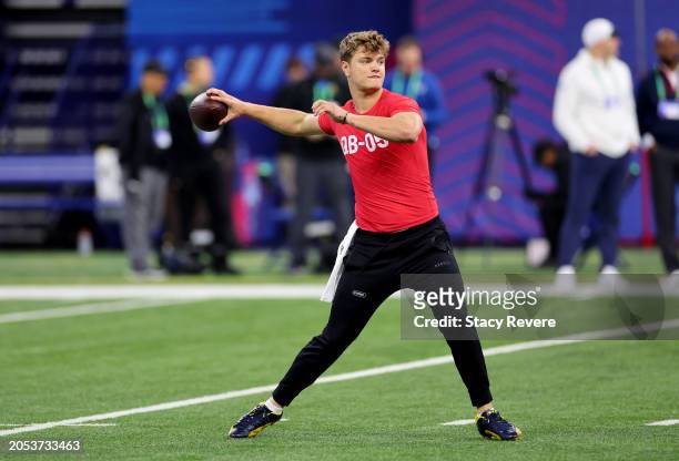 McCarthy #QB05 of Michigan participates in a drill during the NFL Combine at Lucas Oil Stadium on March 02, 2024 in Indianapolis, Indiana.