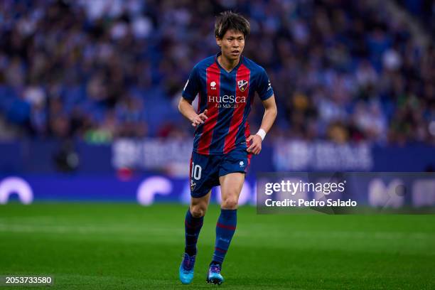 Kento Hashimoto of SD Huesca looks on during the LaLiga Hypermotion match between RCD Espanyol and SD Huesca at Stage Front Stadium on March 02, 2024...