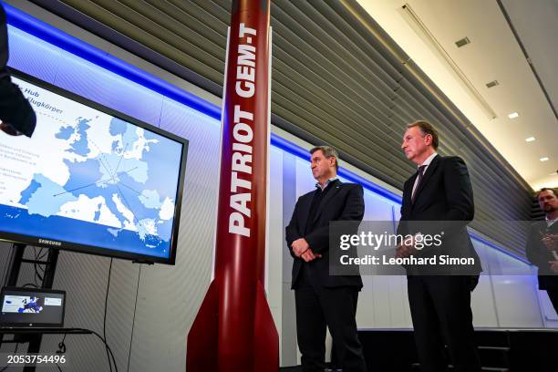 Bavarian Premier Markus Soeder looks at a Patriot Gem-T display while visiting a production facility of MBDA Deutschland on March 5, 2024 in...