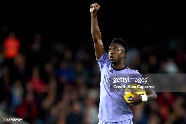 Vinicius Junior of Real Madrid CF celebrates after scoring his team's first goal during the LaLiga EA Sports match between Valencia CF and Real...