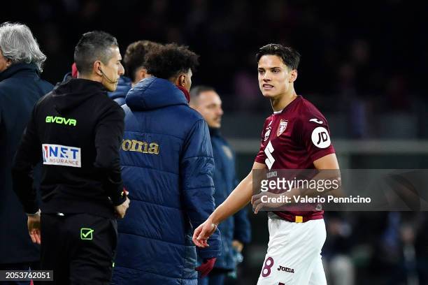 Samuele Ricci of Torino FC looks dejected after being shown a red card by Referee Matteo Marchetti during the Serie A TIM match between Torino FC and...