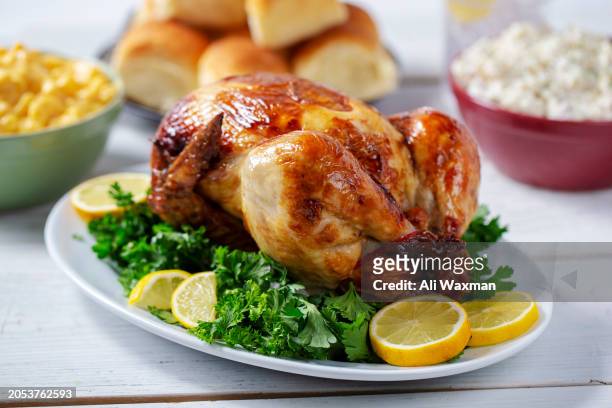 rotisserie chicken lemon - rotisserie stock pictures, royalty-free photos & images