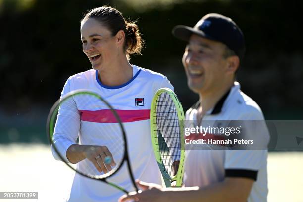 Former Australian tennis player Ash Barty plays tennis with managing director of Millbrook Resort, Gota Ishii during day four of the 2024 New Zealand...