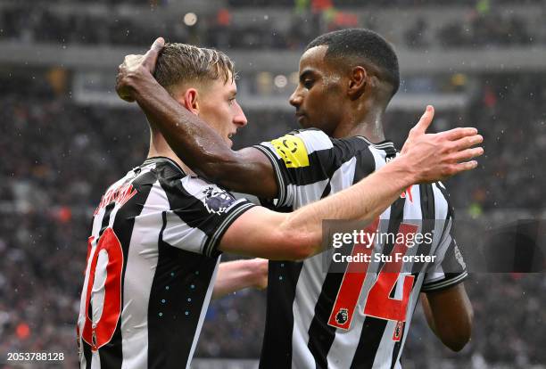 Newcastle United player Alexander Isak celebrates with goalscorer of the second goal Anthony Gordon during the Premier League match between Newcastle...