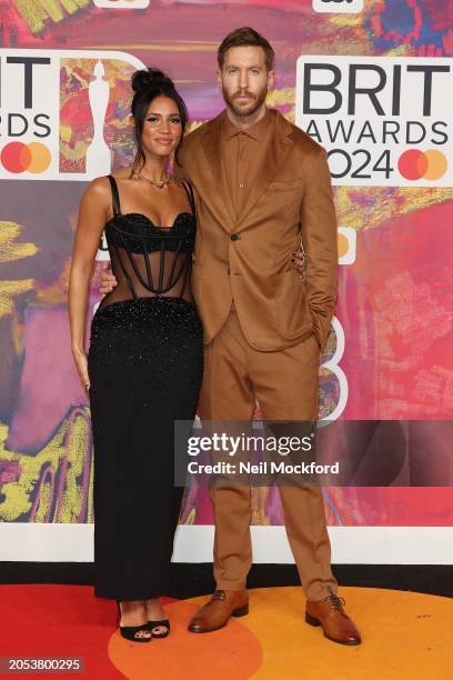 Vick Hope and Calvin Harris attend the BRIT Awards 2024 at The O2 Arena on March 02, 2024 in London, England.