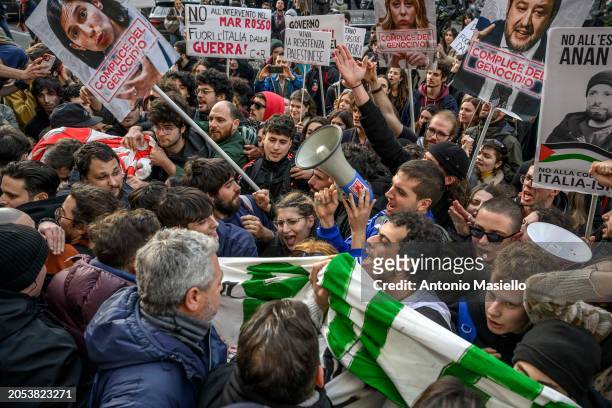 Students face the Italian police to enter the faculty of Psychology at La Sapienza University during a demonstration to call for a ceasefire in the...