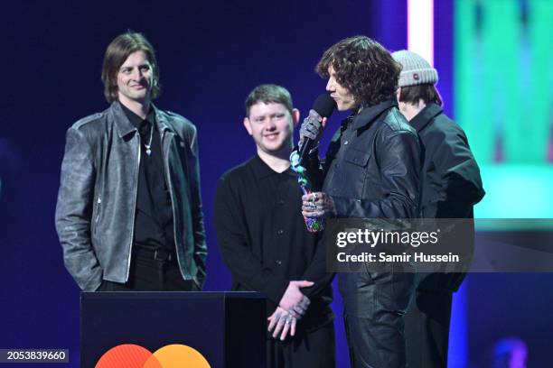 Matt Kean, Lee Malia, Oliver Sykes and Mat Nicholls the group Bring Me The Horizon wins the Best Alternative Rock act during the BRIT Awards 2024 at...