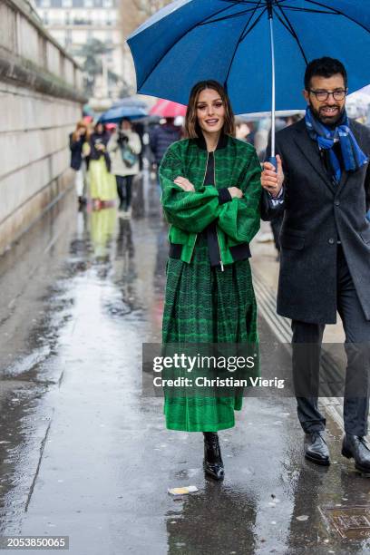 Olivia Palermo wears green zipper jacket, skirt outside Ellie Saab during the Womenswear Fall/Winter 2024/2025 as part of Paris Fashion Week on March...