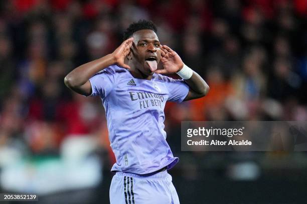 Vinicius Junior of Real Madrid celebrates scoring his team's second goal during the LaLiga EA Sports match between Valencia CF and Real Madrid CF at...