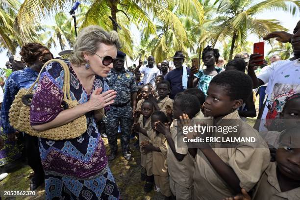 Queen Mathilde of Belgium pictured during a royal visit to Grand-Lahou and its cemetery, during a royal working visit to Ivory Coast, Tuesday 05...