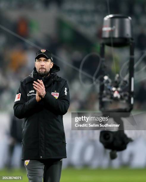 Head coach Sebastian Hoeness of Stuttgart applauds the fans after the team's victory during the Bundesliga match between VfL Wolfsburg and VfB...