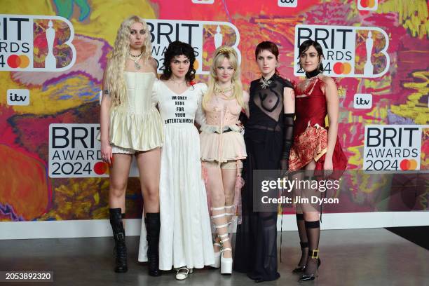 Georgia Davies, Abigail Morris, Emily Roberts, Lizzie Mayland and Aurora Nishevci of The Last Dinner Party attend the BRIT Awards 2024 at The O2...