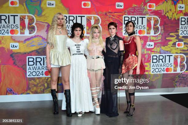 Georgia Davies, Abigail Morris, Emily Roberts, Lizzie Mayland and Aurora Nishevci of The Last Dinner Party attend the BRIT Awards 2024 at The O2...