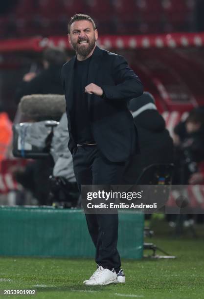 Roma coach Daniele De Rossi issues instructions to his players during the Serie A TIM match between AC Monza and AS Roma at U-Power Stadium on March...