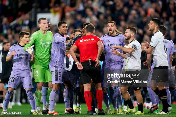 Jude Bellingham of Real Madrid CF protests the referee's final whistle decision after the LaLiga EA Sports match between Valencia CF and Real Madrid...