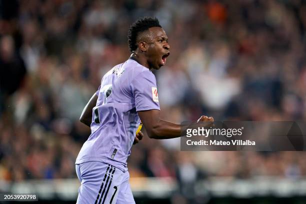 Vinicius Junior of Real Madrid CF celebrates after scoring his team's first goal during the LaLiga EA Sports match between Valencia CF and Real...
