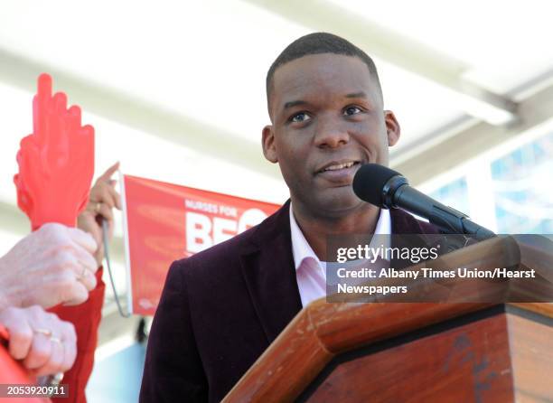 Corey Ellis speaks as more than a thousand nurses and Safe Staffing supporters rally at the Capitol calling for the passage of the Safe Staffing Law...