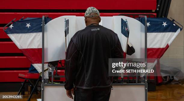 Voter casts their ballots at a polling station in Nashville, Tennessee, on Super Tuesday, March 5, 2024. Americans from 15 states and one territory...