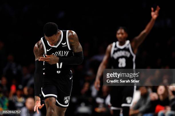 Dennis Schroder of the Brooklyn Nets reacts after scoring during the second half against the Atlanta Hawks at Barclays Center on March 02, 2024 in...