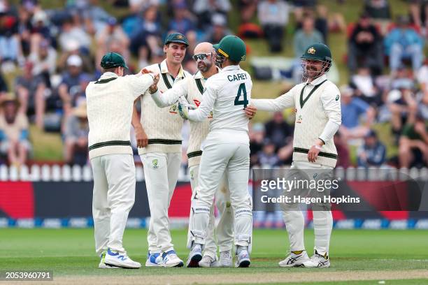 Nathan Lyon of Australia celebrates after taking the wicket of Glenn Phillips of New Zealand for a five wicket bag during day four of the First Test...