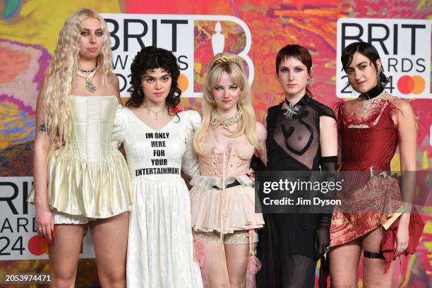 Georgia Davies, Abigail Morris, Emily Roberts, Lizzie Mayland and Aurora Nishevci of The Last Dinner Party attend the BRIT Awards 2024 at The O2...