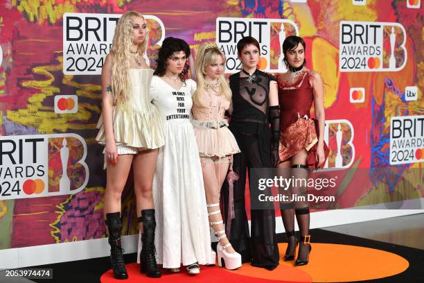 Georgia Davies, Abigail Morris, Emily Roberts, Lizzie Mayland and Aurora Nishevci of The Last Dinner Party attend the BRIT Awards 2024 at The O2...