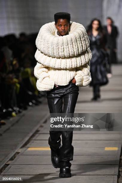 Model walks the runway during the Alexander McQueen Womenswear Fall/Winter 2024-2025 show as part of Paris Fashion Week on March 02, 2024 in Paris,...