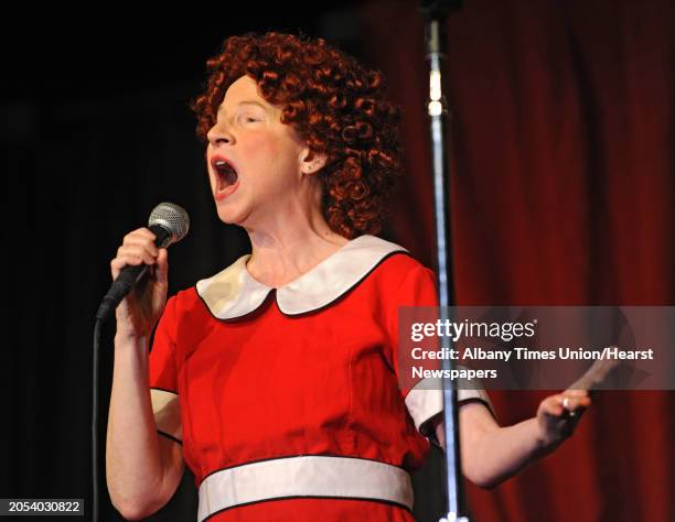 Cathy Woodruff, playing Kathy Hochul sings a song during rehearsal night for this year's Legislative Correspondents Association show "Downtown Andy"...