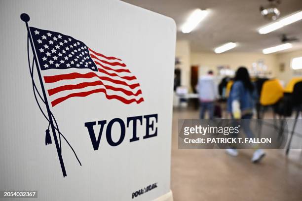 Voter casts a ballot during the Super Tuesday primary at a polling station in an American Legion Post in Hawthorne, California, March 5, 2024....