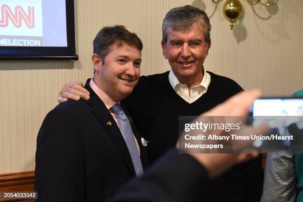 Albany County Democratic Committee Chair Jack Flynn, left, has his photo taken with New York Senator Neil Breslin as the Albany County Democratic...