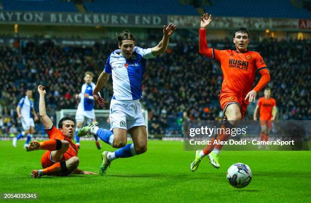 Blackburn Rovers' Callum Brittain is fouled by Millwall's George Honeyman during the Sky Bet Championship match between Blackburn Rovers and Millwall...