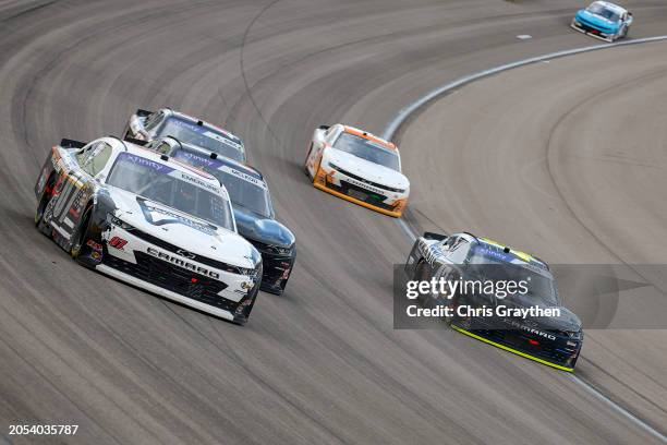 Patrick Emerling, driver of the Frontline Optics Chevrolet, BJ McLeod, driver of the BJ McLeod Motorsports Chevrolet, and Ryan Ellis, driver of the...