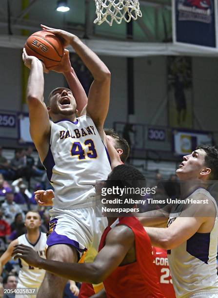 University at Albany's Greig Stire drives to the hoop during a basketball game against Cornell at the SEFCU Arena on Monday, Jan. 2, 2017 in Albany...