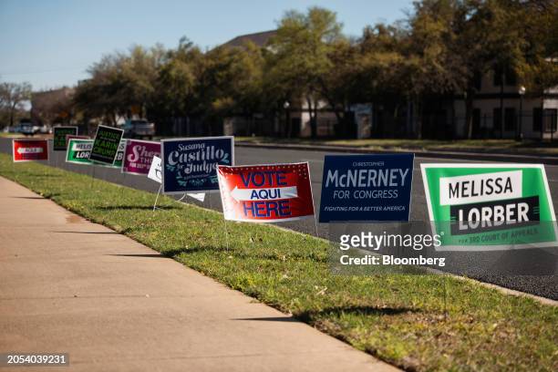 Campaign signs outside a polling station in Austin, Texas, US, on Tuesday, March 5, 2024. This year's Super Tuesday primaries will put Donald Trump...