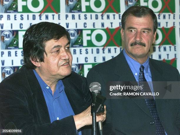 Leader of the leftist party Joel Ortega announces the party's support to the candidacy of conservative candidate Vicente Fox in Mexico City, 29 May,...