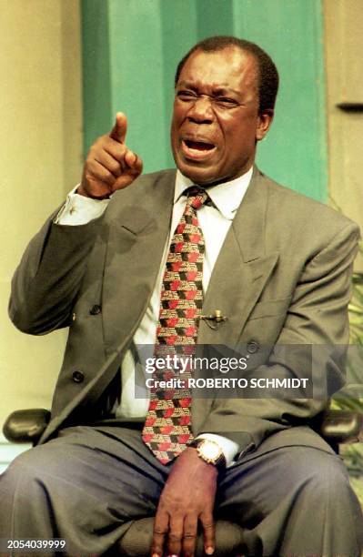 Dominican Republic presidential candidate Jose Francisco Pena Gomez of the Revolutionary Democratic Party appears 18 May 1994 on a live television...