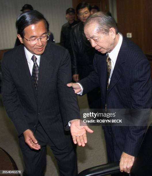 Hsu Wen-Long , president of the Chi Mei Corporation, one of Taiwan's largest plastics and textiles conglomerates, meets with presidential candidate...